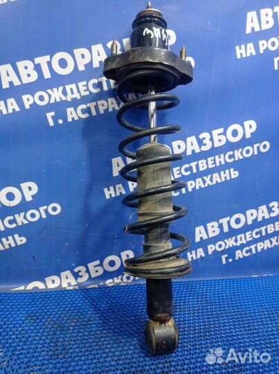 Задняя стойка амортизатора Mitsubishi Lancer Cedia