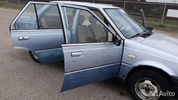 Дверь nissan sunny b11
