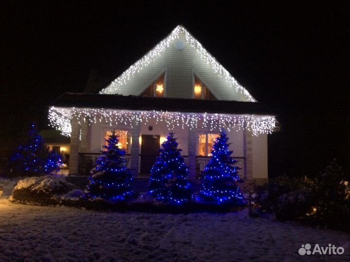 Украшение фасада зданий новогодними гирляндами
