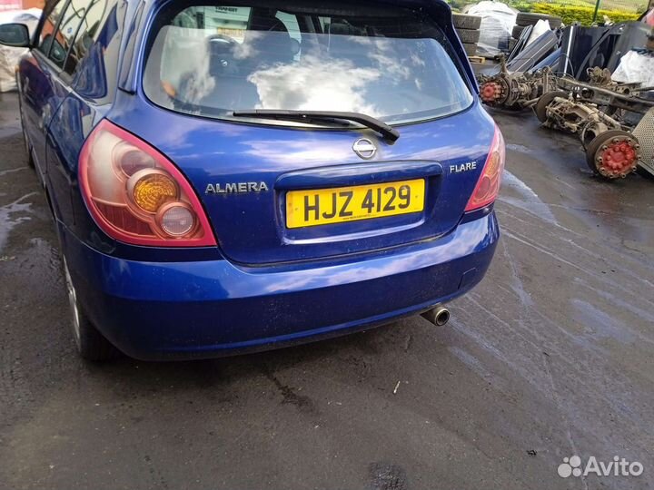 Стойка передняя левая nissan almera N16 2004