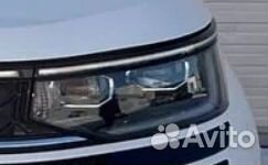 Фара левая Volkswagen Tavendor