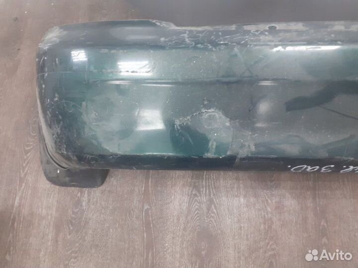 Бампер задний Mazda Familia