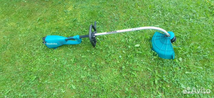 Триммер электрический makita