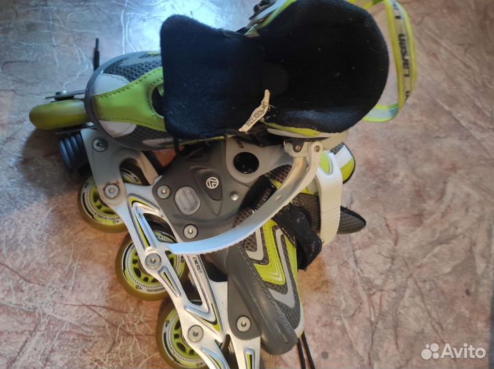 Роликовые коньки