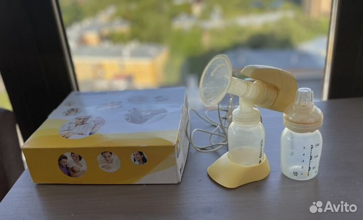Молокоотсос medela mini electric