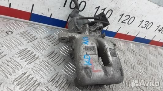 Суппорт тормозной задний левый volkswagen passat B