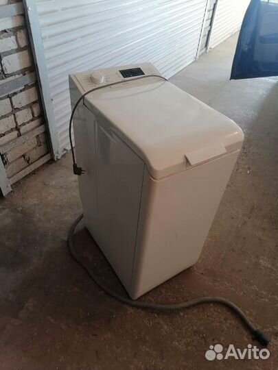 Стиральная машина с верхней загрузкой electrolux