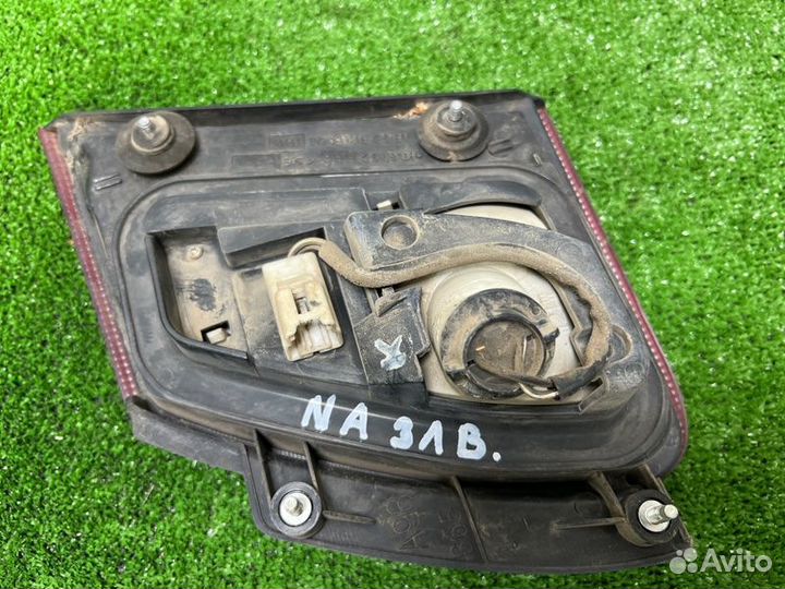 Фонарь заднего хода задний левый Nissan Almera N16