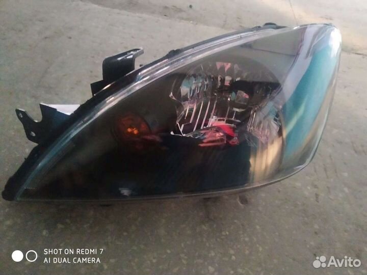 Фара Митсубиси Лансер 9 новая,чёрная