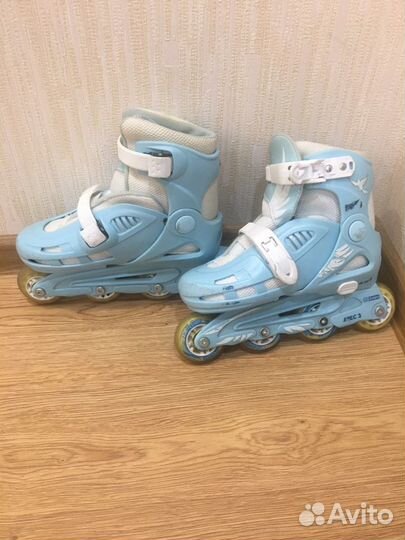 Коньки роликовые