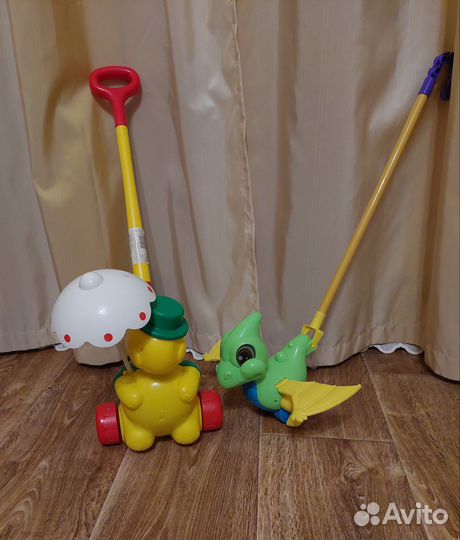 Игрушка каталка с ручкой детская