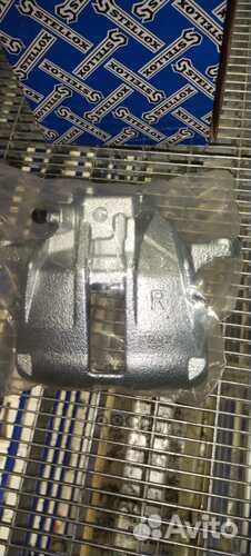 05-90710-SX суппорт тормозной передний правый