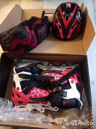 Роликовые коньки