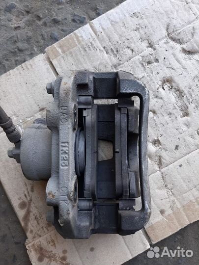 Передний правый тормозной суппорт Daewoo Nexia