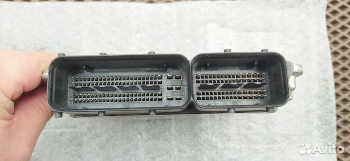 Блок управления двигателем Volkswagen Tiguan 03C90