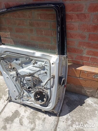 Дверь левая задняя Passat b-5