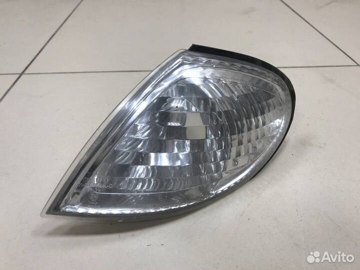 Указатель поворота левый белый Nissan Almera