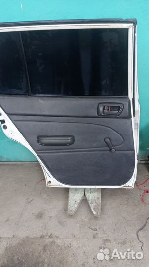 Дверь задняя левая Toyota Caldina