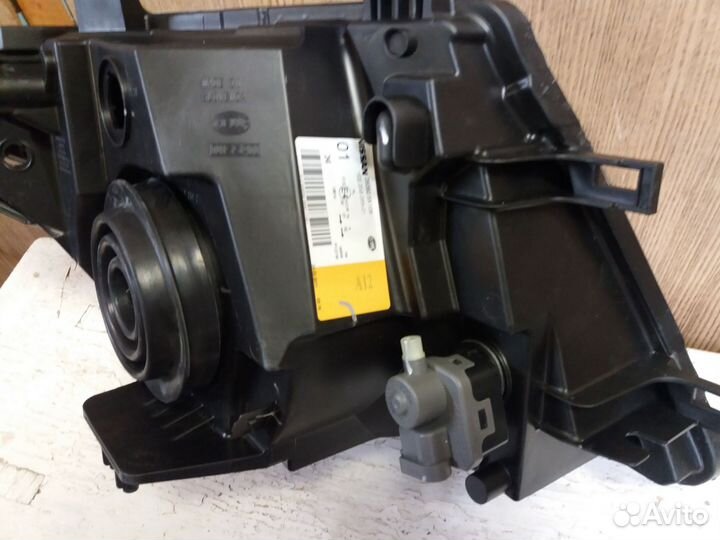 Фара левая Ниссан Патфайндер R51 рестайлинг с 2010