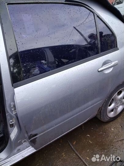 Задняя левая дверь Mitsubishi Lancer 9