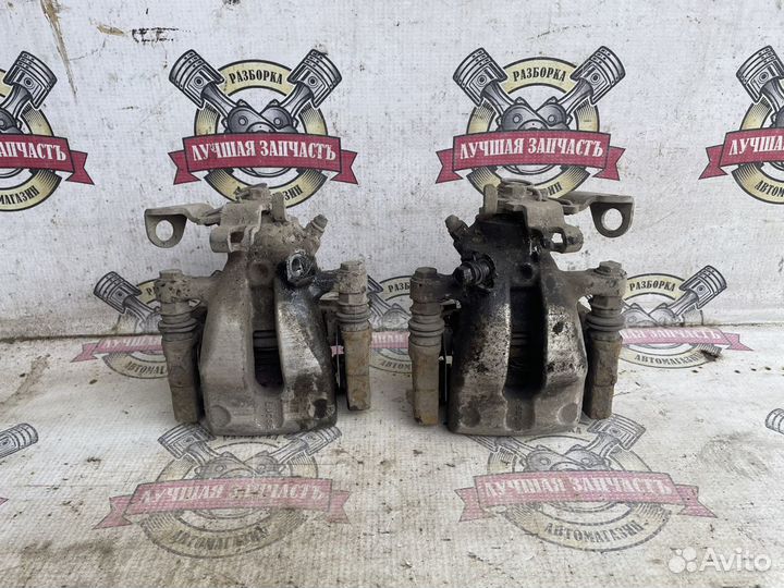 Суппорт задний Опель Астра Н Opel Astra H