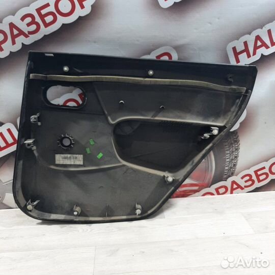 Обшивка боковой двери задняя левая Renault Logan 1