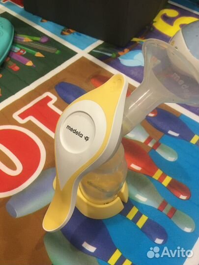 Молокоотсос medela