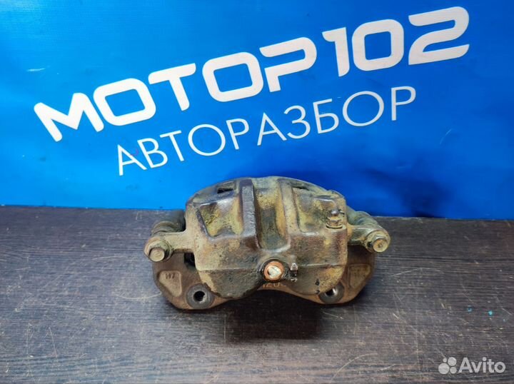 Суппорт передний правый SsangYong Rexton 1