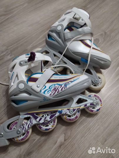 Роликовые коньки