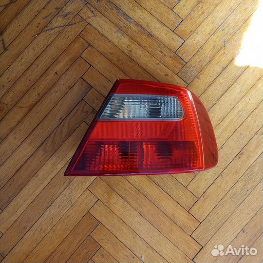 Фонарь правый Каризма