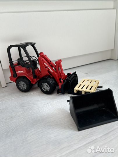 Игрушка bruder Мини - погрузчик schaeffer 2034