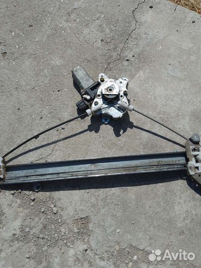 Левый стеклоподъёмник lancer 9