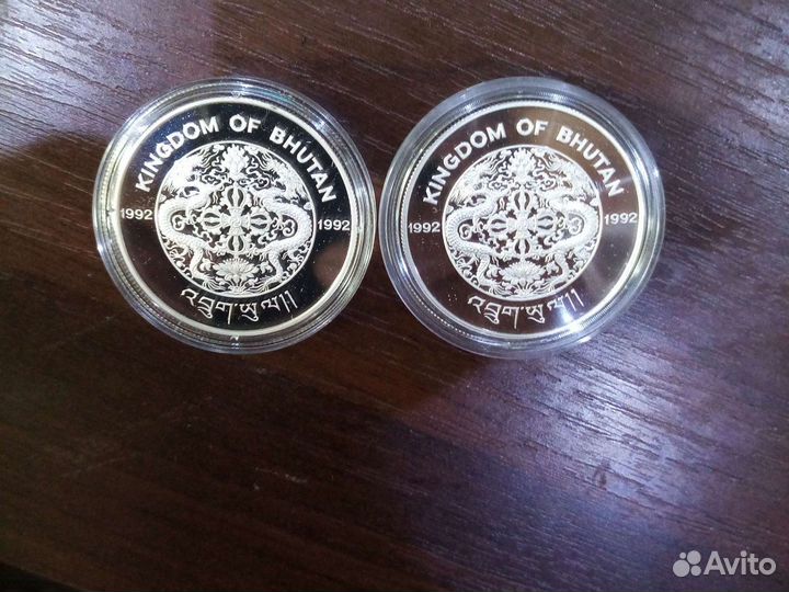 Серебряные монеты к олимпиаде. Бутан и Непал