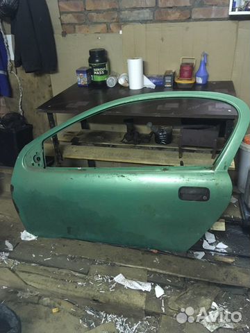 Opel tigra дверь левая