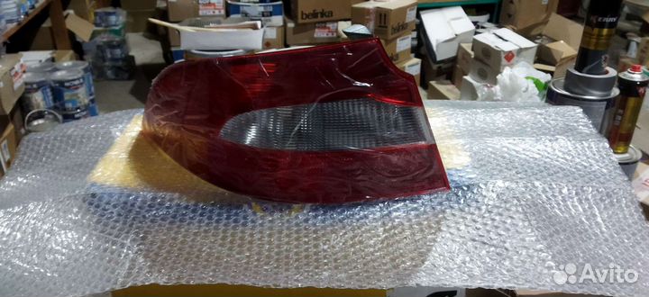 Задний фонарь левый skoda superb 2011
