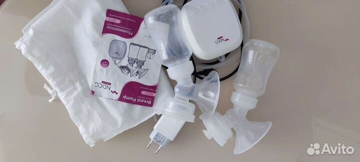 Молокоотсос электрический