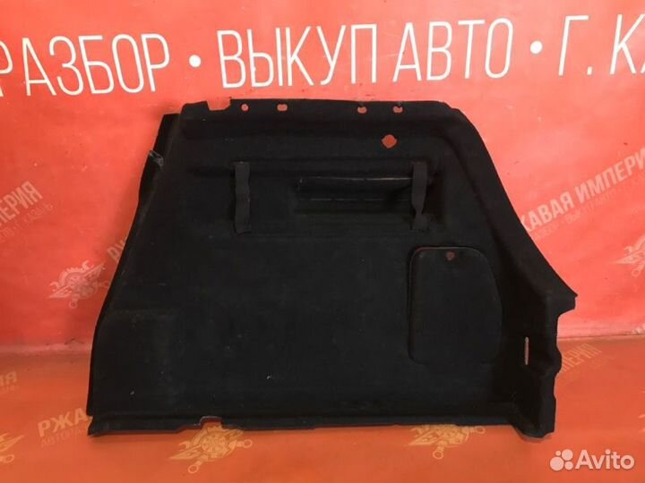 Обшивка багажника задняя правая Opel Astra J
