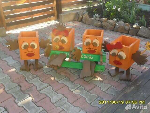 Необычные деревянные кашпо фигурки для сада