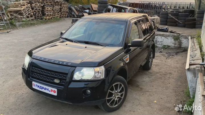 Стекло кузовное глухое левое Land Rover Freelander