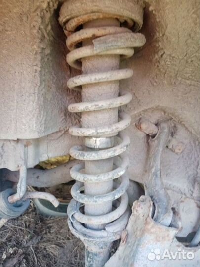 Амортизатор пружина задний Honda Concerto