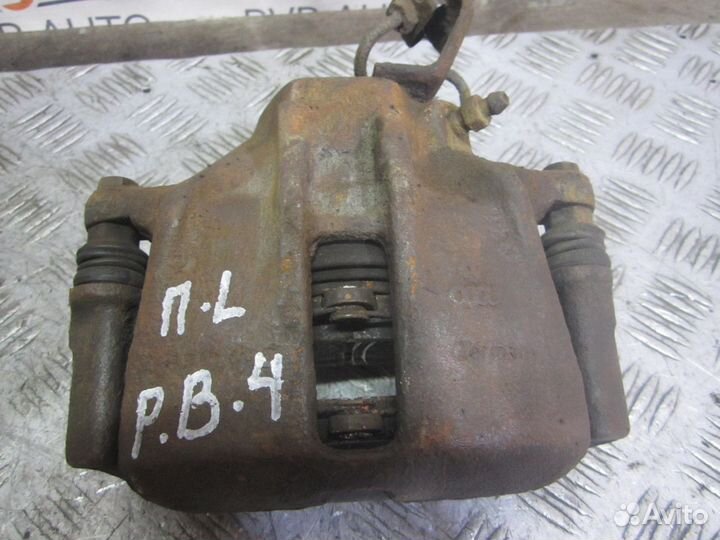 Суппорт тормозной передний Volkswagen Passat B4