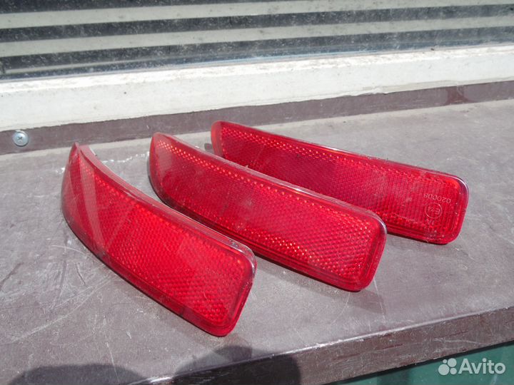 Отражатель заднего бампера правый Рено Логан 1