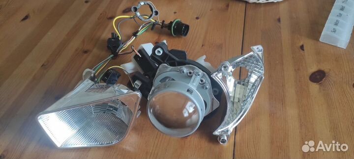 Линза и отражатели фары левой