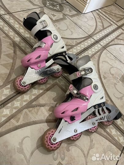 Роликовые коньки