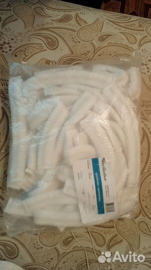 Одноразовые шапочки 