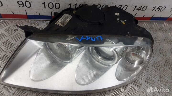 Фара левая Volkswagen Touareg 2005
