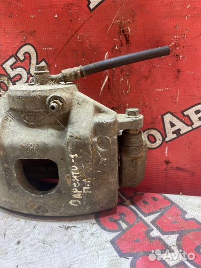 Суппорт тормозной передний левый Kia Sorento 1 EX