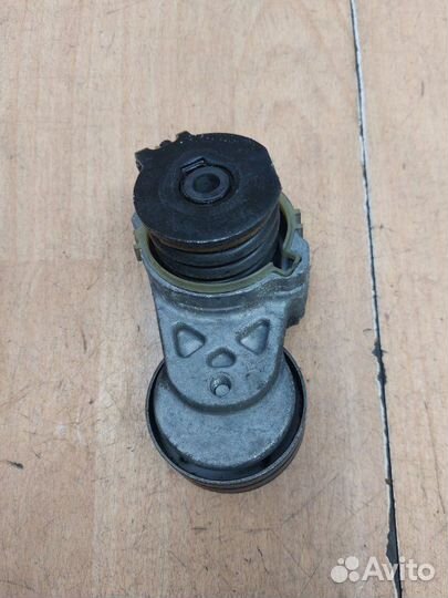 Натяжной ролик приводного ремня Opel Astra H