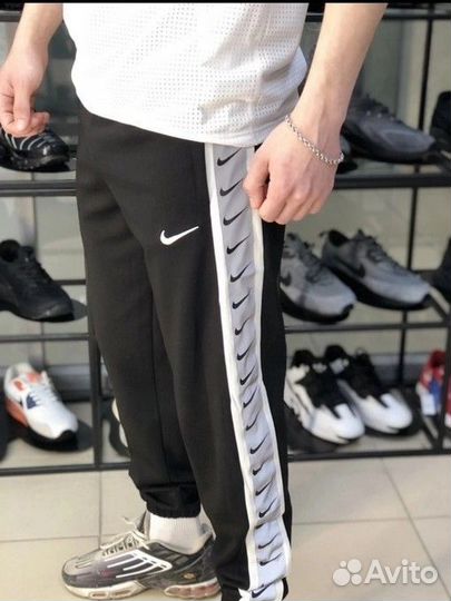 Спортивные штаны nike с лампасами