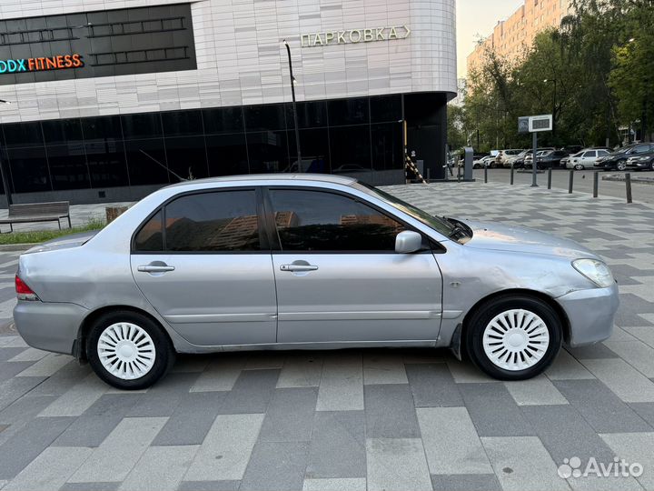 Mitsubishi Lancer 1.6 МТ, 2004, 280 000 км